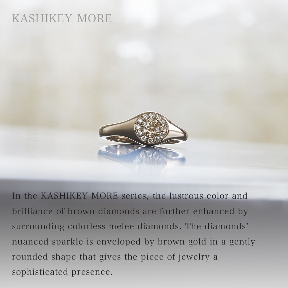 The lustrous color and brilliance of brown diamonds are enhanced even further by the surrounding colorless melee diamonds. The pendant top wrapped gently in brown gold, has a rich and subtly delicate flush and is filled with alluring presence.